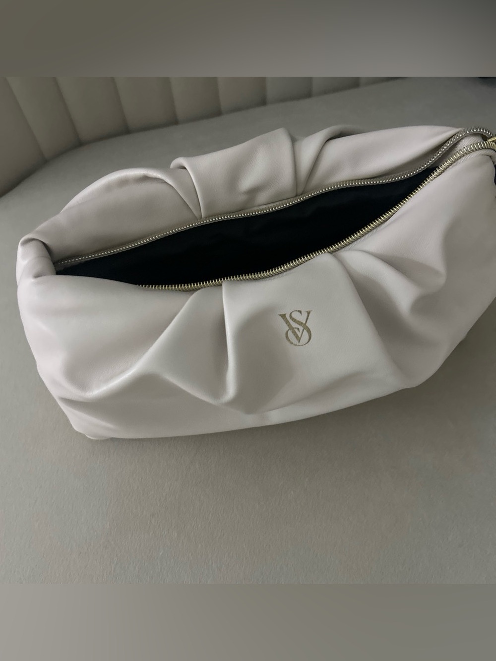 Victoria's Secret Ivory Ruched Leather Wristlet with Gold Logo